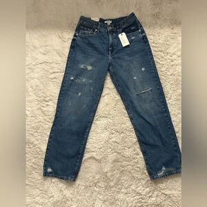 Pair of dad jeans little distressed